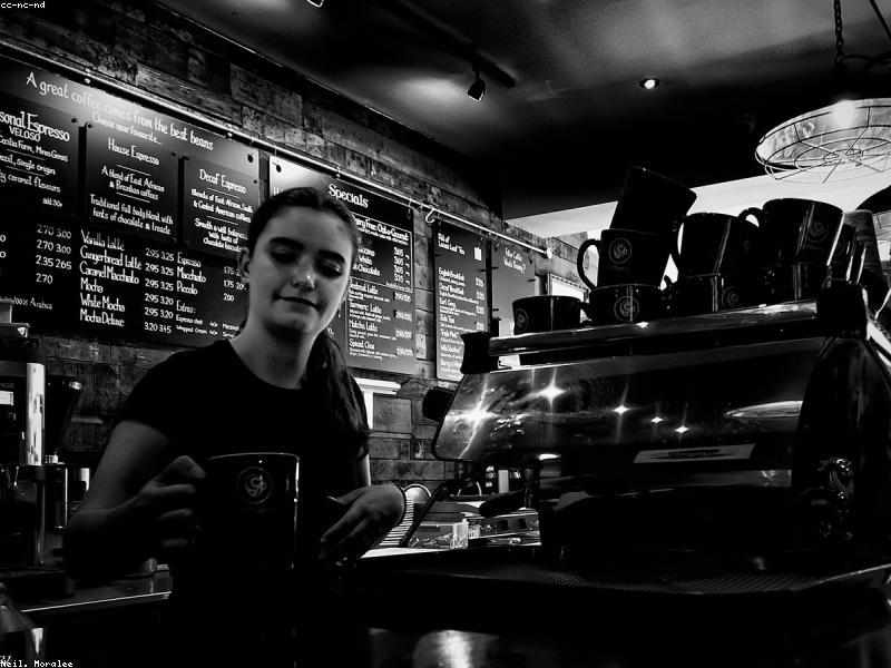 RoastWorksLviv.com team assessing espresso equipment in the Lviv roastery